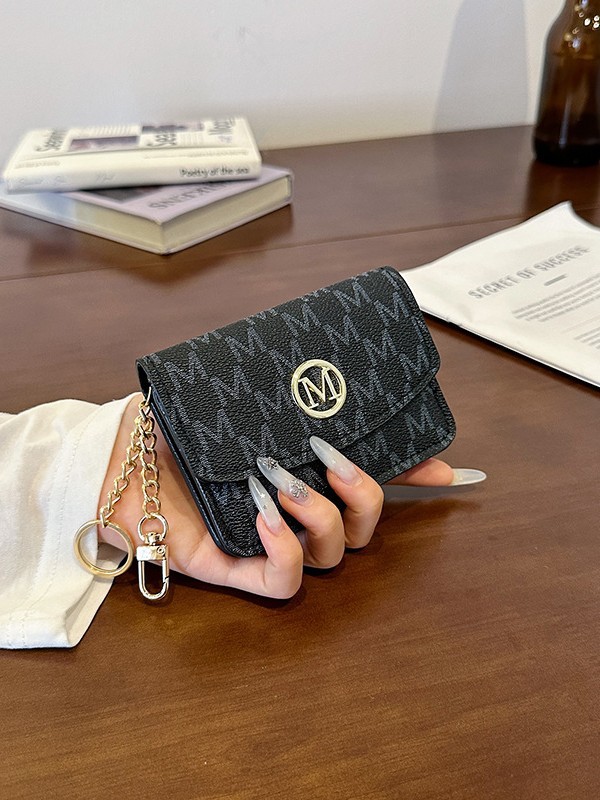 Retro monogramprint kunstleren - Monogram Keychain Leather recensie en prijs
