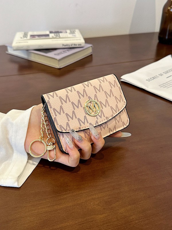 Retro monogramprint kunstleren - Monogram Keychain Leather recensie en prijs