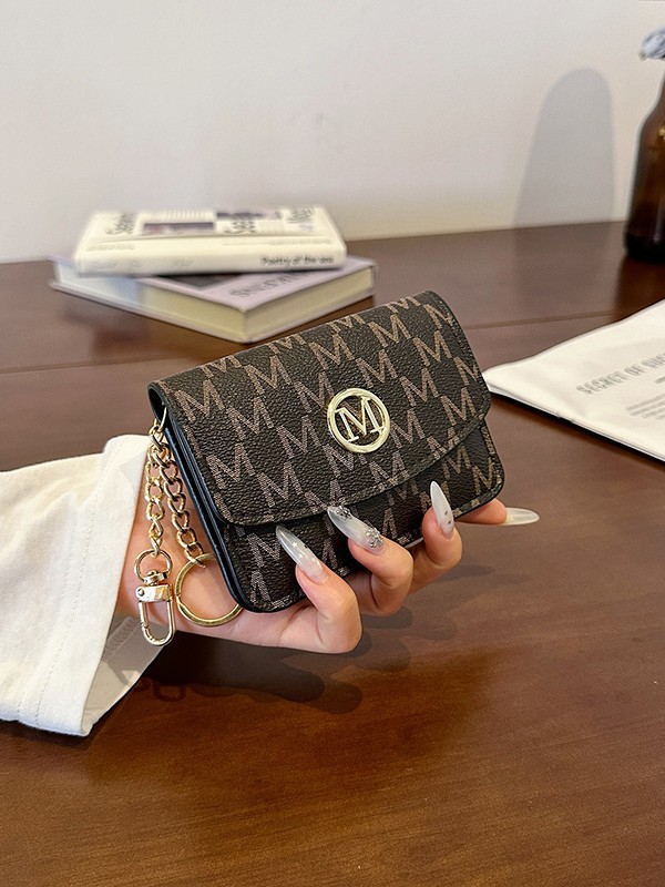 Retro monogramprint kunstleren - Monogram Keychain Leather recensie en prijs